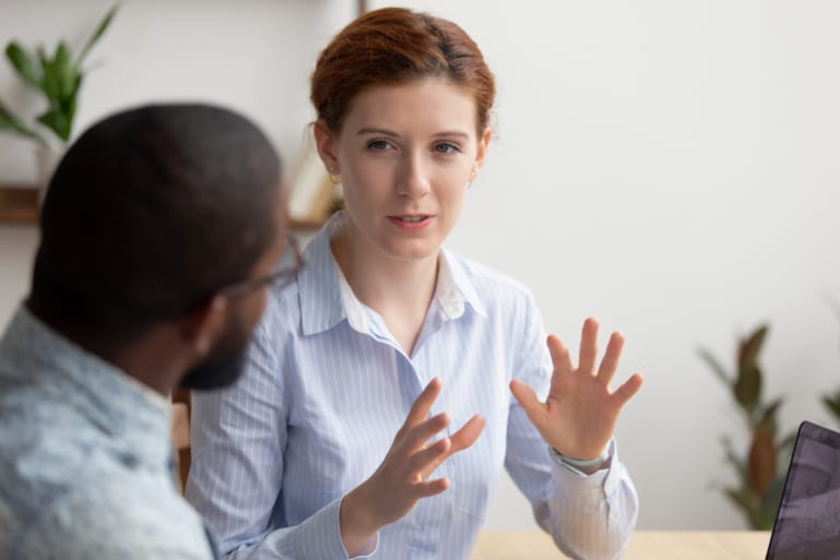 Professional woman giving advice to client